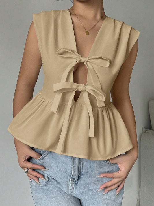 Sleeveless Blouse With Ruffled Hem